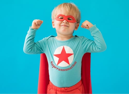 Boy dressed in red blue super hero with a star and superannuatonr 